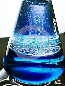 Glass flask with a chemical reagent