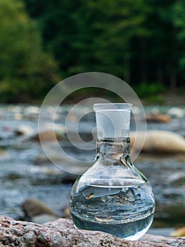 Glass flask with clean drinking water