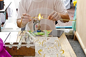Glass is formed by hot fire.