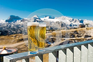 A glass of fresh beer on mountains