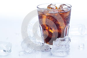 Glass of fresh coke over the white background