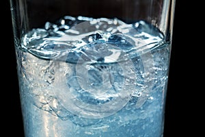 Glass of fresh cool tonic with ice