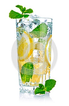 Glass of fresh cool water with lemon