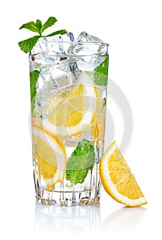 Glass of fresh cool water with lemon