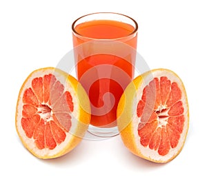 A glass of fresh grapefruit juice and grapefruit slice