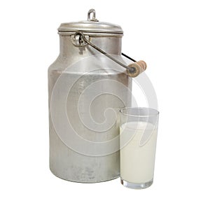 Glass of fresh milk and milk canister