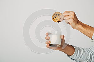 A glass of fresh natural milk with sweet biscuits without sugar and gluten