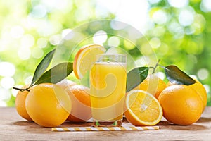 glass of fresh orange juice with fresh fruits