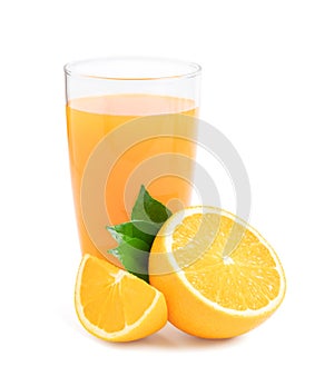 Glass of fresh orange juice with fruits cut in half and sliced with green leaf isolated on white background