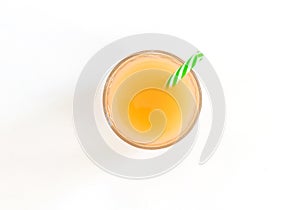 Glass of fresh orange juice isolated on white background, top vi
