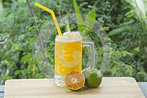 Glass of fresh orange juice smoothie