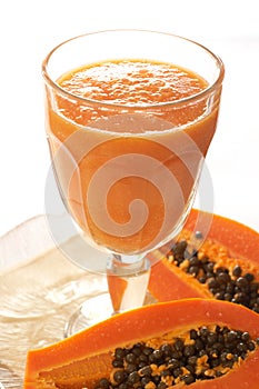 Glass of fresh papaya smoothie