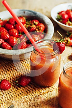 Glass of fresh strawberry nonalcoholic cocktail with berries.