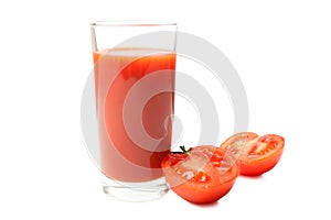 Glass of fresh tomato juice and natural organic tomato