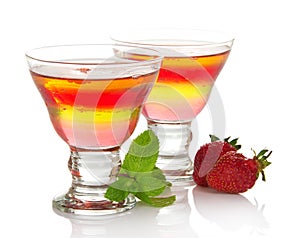 Glass with fruit jelly and strawberry