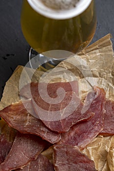 a glass glass with an alcoholic drink in close-up