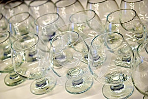 Glass glasses on a white background with a reflection