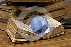 Glass globe and the old book