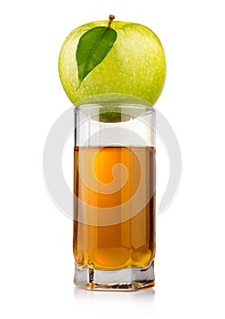 Glass of green apple juice with fruit isolated