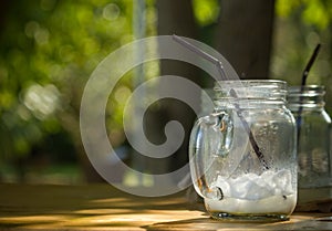 A glass of green tea with milk after drink.