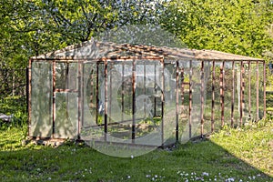 The glass greenhouse on the dacha plot is not ready for growing crops, the SETTING SUN.