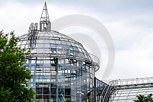 Glass greenhouse with a dome. A separate staircase from the outside to the roof