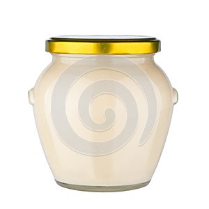 Glass honey jar on white background