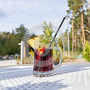 a glass of hot mulled wine to warm up on the beach promenade of Swinoujscie in Poland