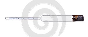 Glass hydrometer for alcohol on a white background.