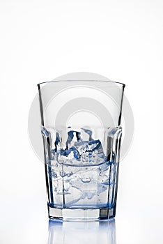 Glass with ice cubes