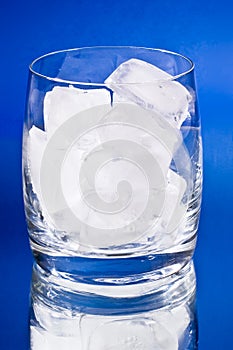 Glass with ice cubes