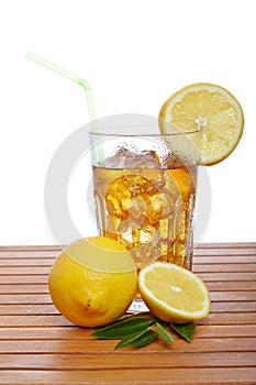 Glass of ice tea with lemon