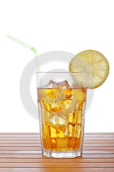 Glass of ice tea with lemon