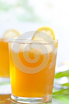 Glass of ice tea with lemon