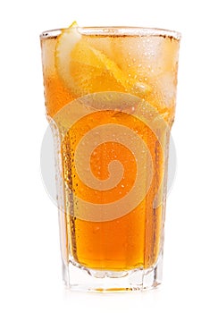 Glass of iced tea with lemon on white background