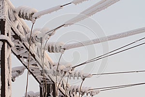 Glass insulator on the power line. Insulator of electrical high-voltage lines