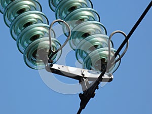 Glass isolator discs in high voltage overhead electrical lines