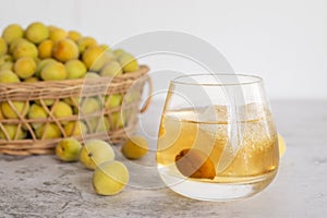 A glass of Japanese plum wine `Umeshu