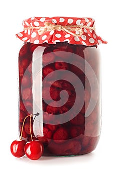 Glass jar of cherry jam