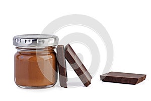 Glass jar with chocolate spred and three pieces photo