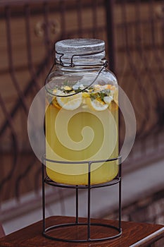 Glass jar with cold lemonade