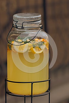 Glass jar with cold lemonade