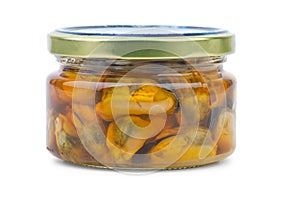 Glass jar with conserved mussels photo