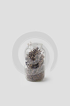 glass jar of dry lavender flowers