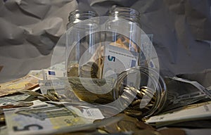 Glass jar of euro coins