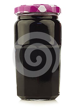 Glass jar with fruit jam