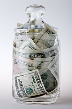 Glass jar full of money