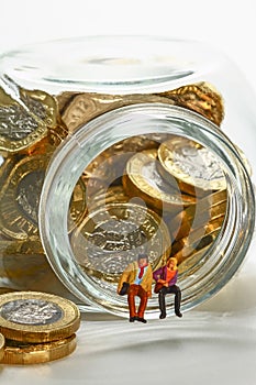 Glass jar full of pound coins