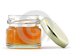 Glass jar of honey