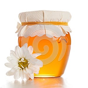 Glass jar with honey